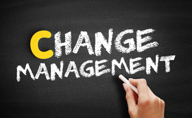 Change Management text on blackboard, business concept background