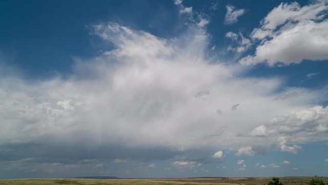 Time lapse of clouds moving over the New Mexico landscape as storm moves away.