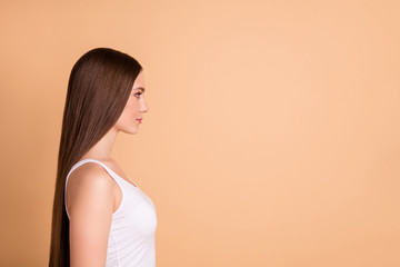 Profile side view portrait of her she nice-looking lovely sweet attractive glamorous winsome well-groomed gorgeous candid lady copy space isolated over beige background