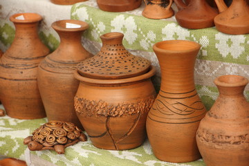 Fototapeta na wymiar Clay jugs, modern production of traditional ceramic ware