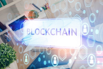 Cryptocurrency hologram over hands taking notes background. Concept of blockchain. Multi exposure