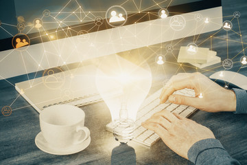 Social network theme hologram with businessman working on computer on background. Multi exposure.
