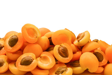 Ripe juicy orange apricots slices isolated on white background. Space for text or design.