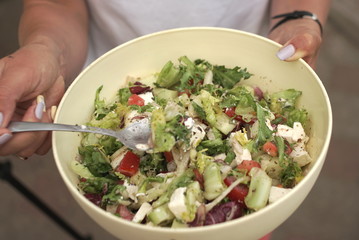Diced feta cheese with fresh vegetable salad 