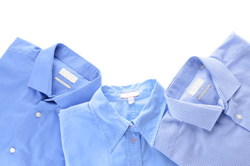 Shirts after dry-cleaning on white background