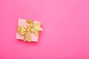 Beautiful gift box on color background