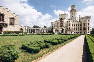 Hluboka nad Vltavou, Czech Republic, MAY 4, 2018 - the ensemble of the white castle Hluboka nad Vltavou and the park in sunny weather. The architectural ensemble in the Czech Republic.