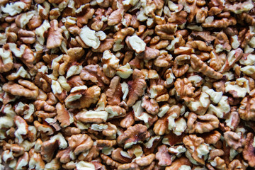 texture of walnuts, brown background healthy food, close up.