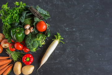 Healthy vegetables on dark background