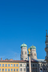 Fototapeta na wymiar Munich Cathedral Domes from Marienplatz with Virgin Mary Column