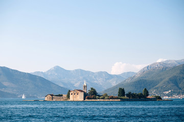 Adriatic Sea, Montenegro. View of a small church on the island of St. George in the Bay of Kotor,...