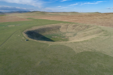 Meteorite crater in the Southeast of the Zabaikalsky region, near the Chinese border, the Crater in the shape of the bowl has a diameter of 270 meters and a depth of 15 meters.