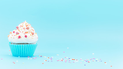 Birthday cupcake with confetti