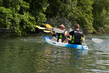 Tourists kayaking on river Clain at Poitiers in France