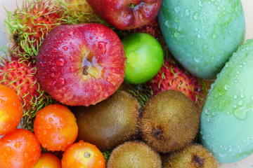 Mixed of tropical fruits close up, healthy concept.