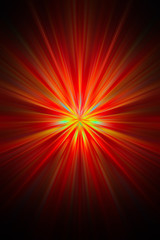 Bright rays of light of red and yellow shine from the center forming a circle on a black background.