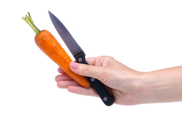 Carrot vegetable knife in hand on white background isolation