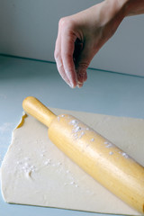 sprinkle flour on your own with a rolling pin