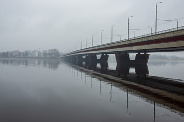 concrete brick bridge over the river