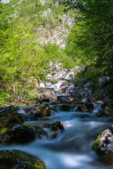 Naklejka na ściany i meble Soca river near its spring at the Soca Valley in Slovenia