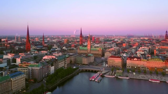 hamburg aerial shot drone fly forward over binnenalster lake towards the town hall