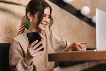 Beautiful lovely woman relaxing at the cafe