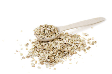 Wooden spoon with muesli on a white background