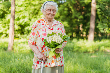 Grandmother. Grandmother at the age of one hundred years walks in the park