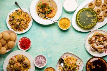 Fototapeta na wymiar group of Bombay chat food includes golgappa/panipuri, bhel-puri, sev-poori, dahipuri, Ragda pattice, raj kachori etc. selective focus