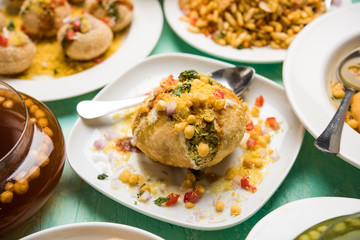 group of Bombay chat food includes golgappa/panipuri, bhel-puri, sev-poori, dahipuri, Ragda pattice, raj kachori etc. selective focus
