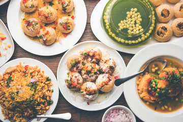 group of Bombay chat food includes golgappa/panipuri, bhel-puri, sev-poori, dahipuri, Ragda pattice, raj kachori etc. selective focus
