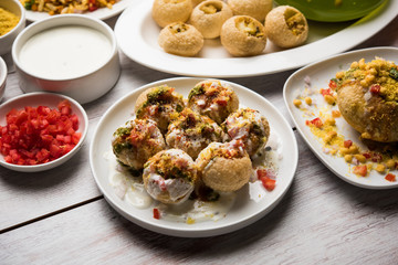 group of Bombay chat food includes golgappa/panipuri, bhel-puri, sev-poori, dahipuri, Ragda pattice, raj kachori etc. selective focus