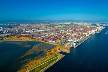 Fototapeta na wymiar Oakland Harbor port terminal with shipping containers