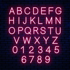 Bright neon letters isolated on wall background. Vector neon red font, alphabet. Glowing letters for signboard.