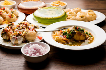 group of Bombay chat food includes golgappa/panipuri, bhel-puri, sev-poori, dahipuri, Ragda pattice, raj kachori etc. selective focus