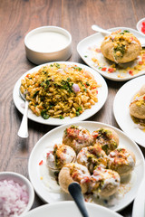 group of Bombay chat food includes golgappa/panipuri, bhel-puri, sev-poori, dahipuri, Ragda pattice, raj kachori etc. selective focus