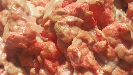 Red fresh lungs meat small steaks with whitish meat fat.