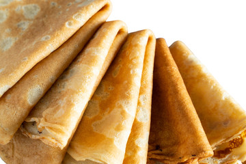 fresh baked thin pancake on white isolated background.