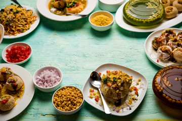 group of Bombay chat food includes golgappa/panipuri, bhel-puri, sev-poori, dahipuri, Ragda pattice, raj kachori etc. selective focus