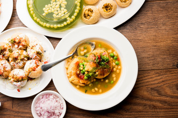 group of Bombay chat food includes golgappa/panipuri, bhel-puri, sev-poori, dahipuri, Ragda pattice, raj kachori etc. selective focus