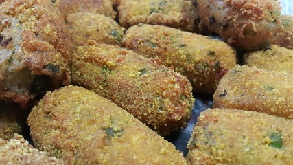 Spicy and delicious fried croquettes with a closeup perspective view