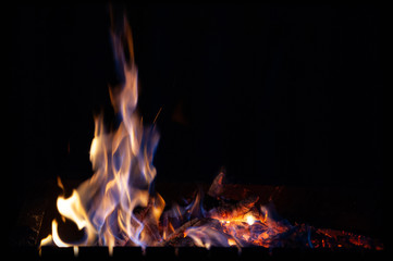 Fire bonfire. The flame of fire burns in an open furnace at night.