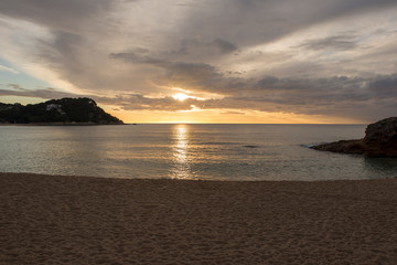 Fototapeta premium Fenals beach in Lloret de Mar at sunrise