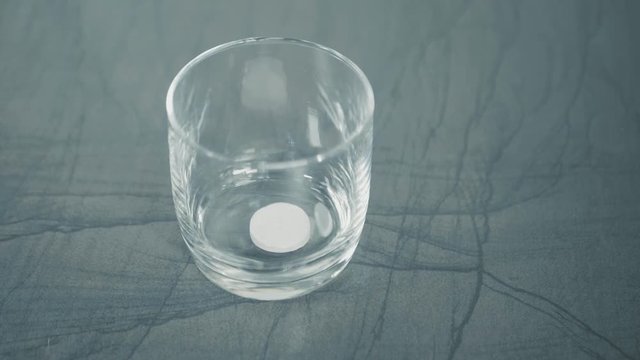 fill a glass with water and a effervescent tablet with magnesium.