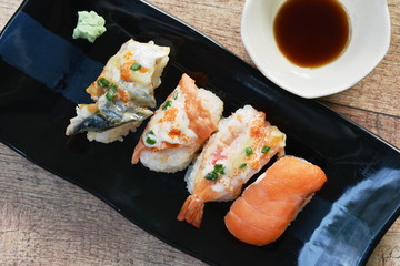 variety Sushi Japanese food with wasabi dipping soy sauce on plate