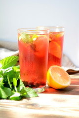 Berry lemonade or sangria in glasses Summer refreshing drink