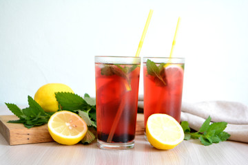Berry lemonade or sangria in glasses Summer refreshing drink