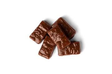 Chocolate sweet with caramel and peanut isolated on white background.