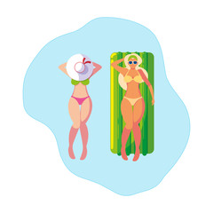 beautiful girls with float mattress floating in water