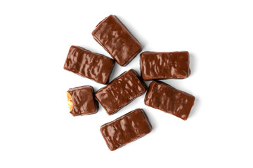 Chocolate sweet with caramel and peanut isolated on white background.
